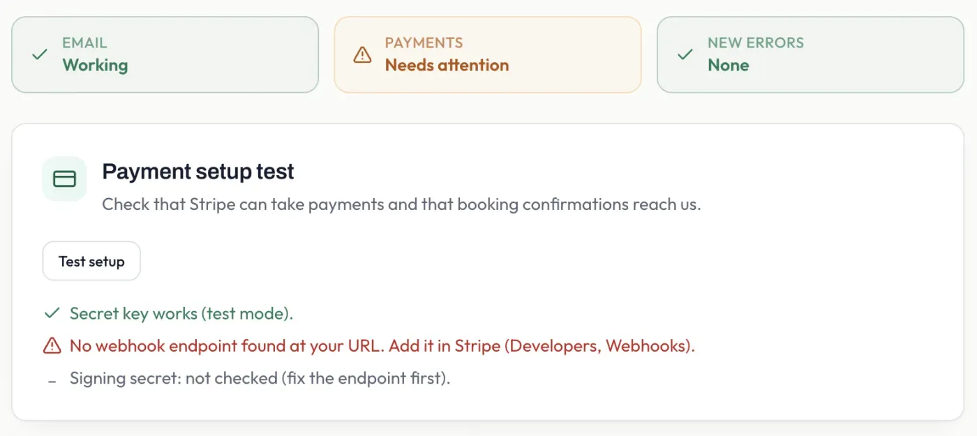 The payment setup test results, showing the secret key works but the webhook is missing